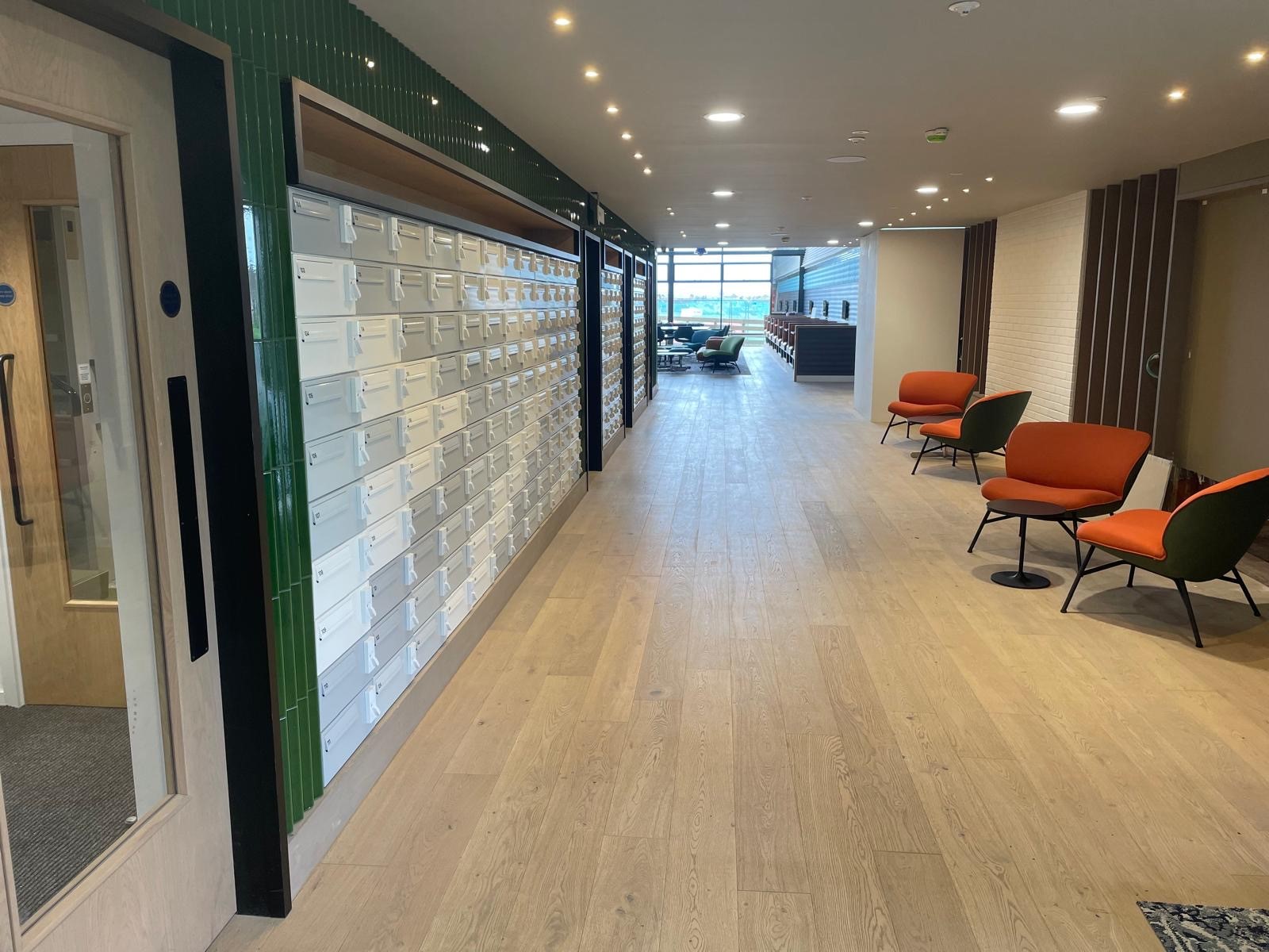 Photo of newly laid hardwood flooring in a commercial premises, performed by SR Flooring in Edinburgh